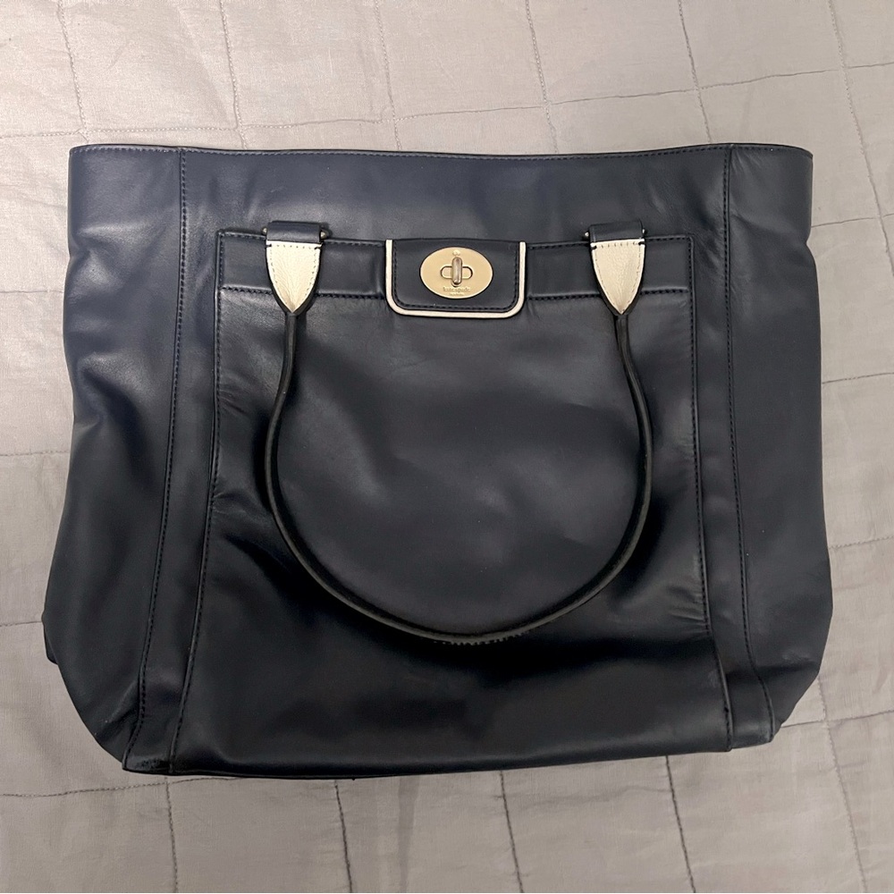 Gently Used Navy Leather Kate Spade Purse with stripped interior